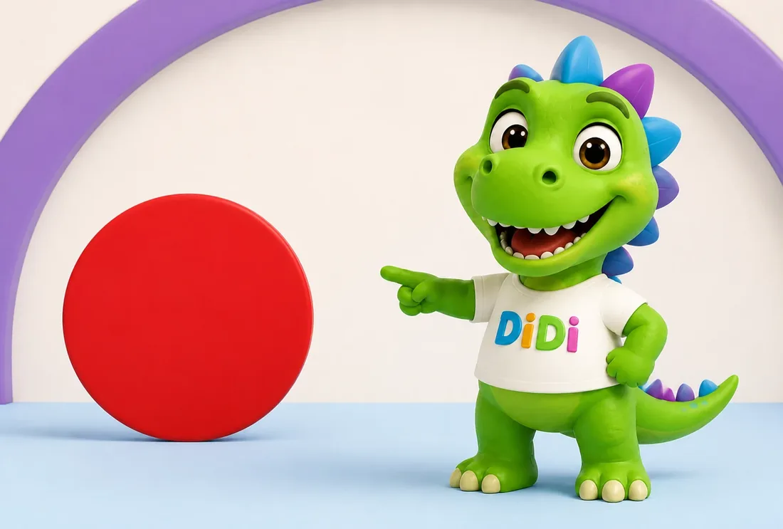 Didi zeigt auf einen roten Ball